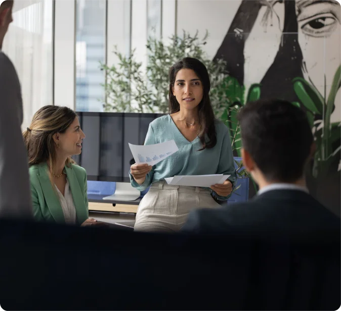 Leadership hiring consultant reviewing candidate profiles for an executive search assignment
